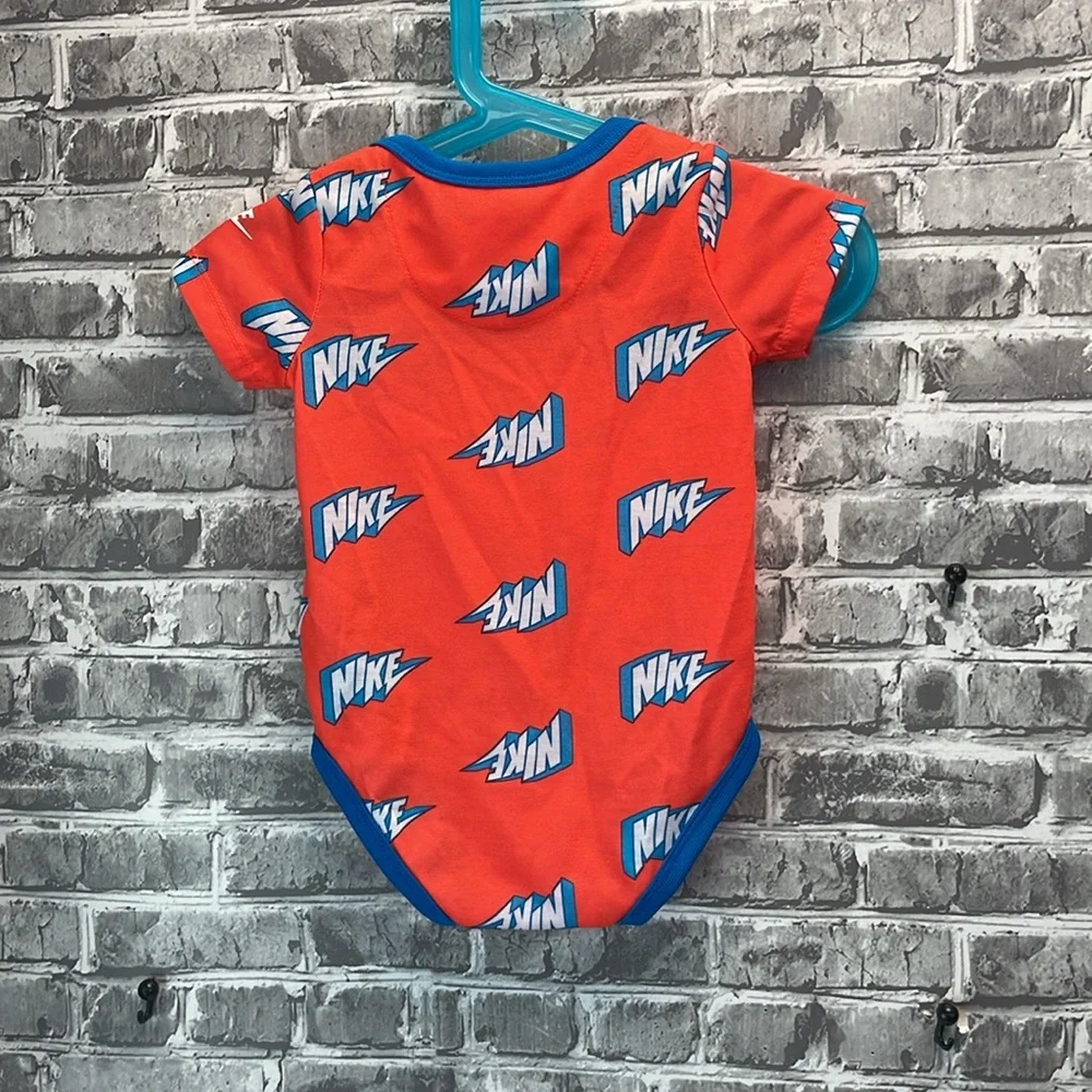 Nike baby onesie in orange  and‎ Blue